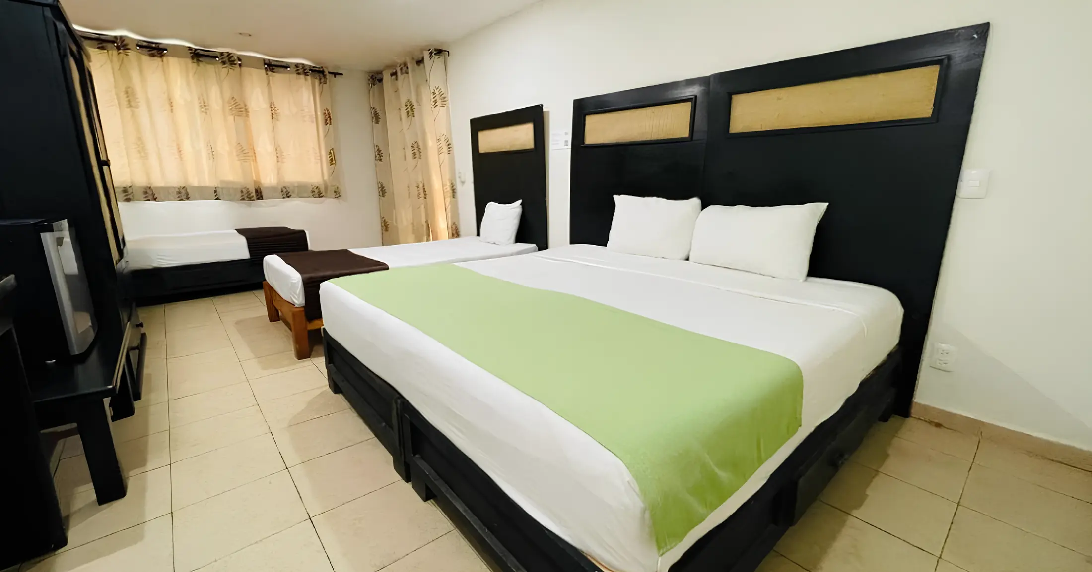 Habitación King + Dos individuales